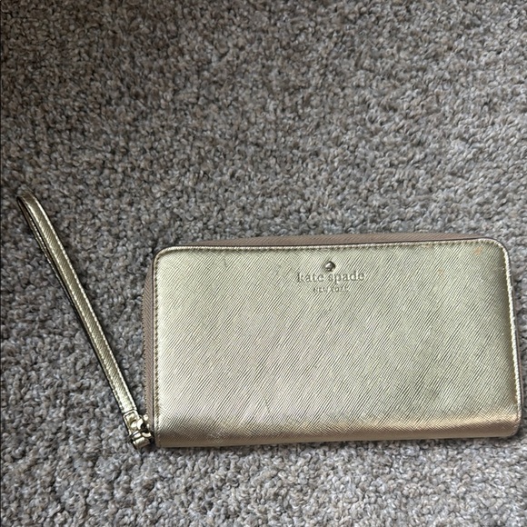 kate spade Handbags - kate spade Metallic Gold Wristlet Wallet